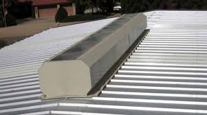 Gutter system for a metal roof