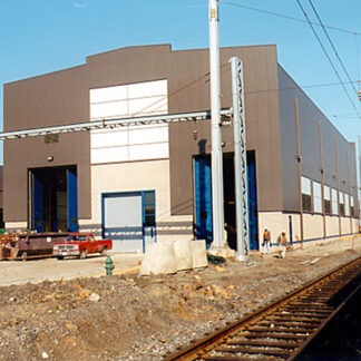 A Brown Color Facility With Parking Space