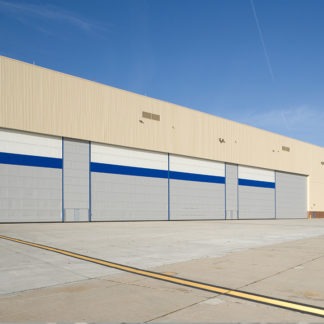 A Warehouse Prototype With White and Blue Shutters