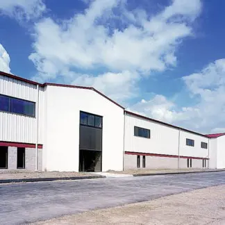 A White Color Warehouse With a Big Entrance Shutter