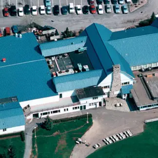 Aerial view of a blue drum building