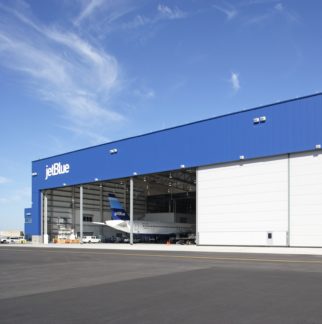 An Airplane Hanger With JetBlue Name