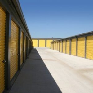 An Array of Storage Facilities With Yellow Shutters